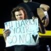 Harry Styles Corrects Fan's Sign